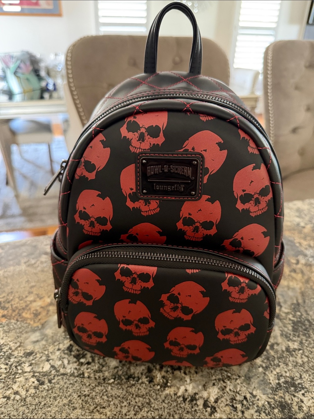 Howl O SCREAM loungefly red skulls